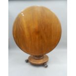 A Victorian tilt-top mahogany breakfast table. 116 cm diameter.