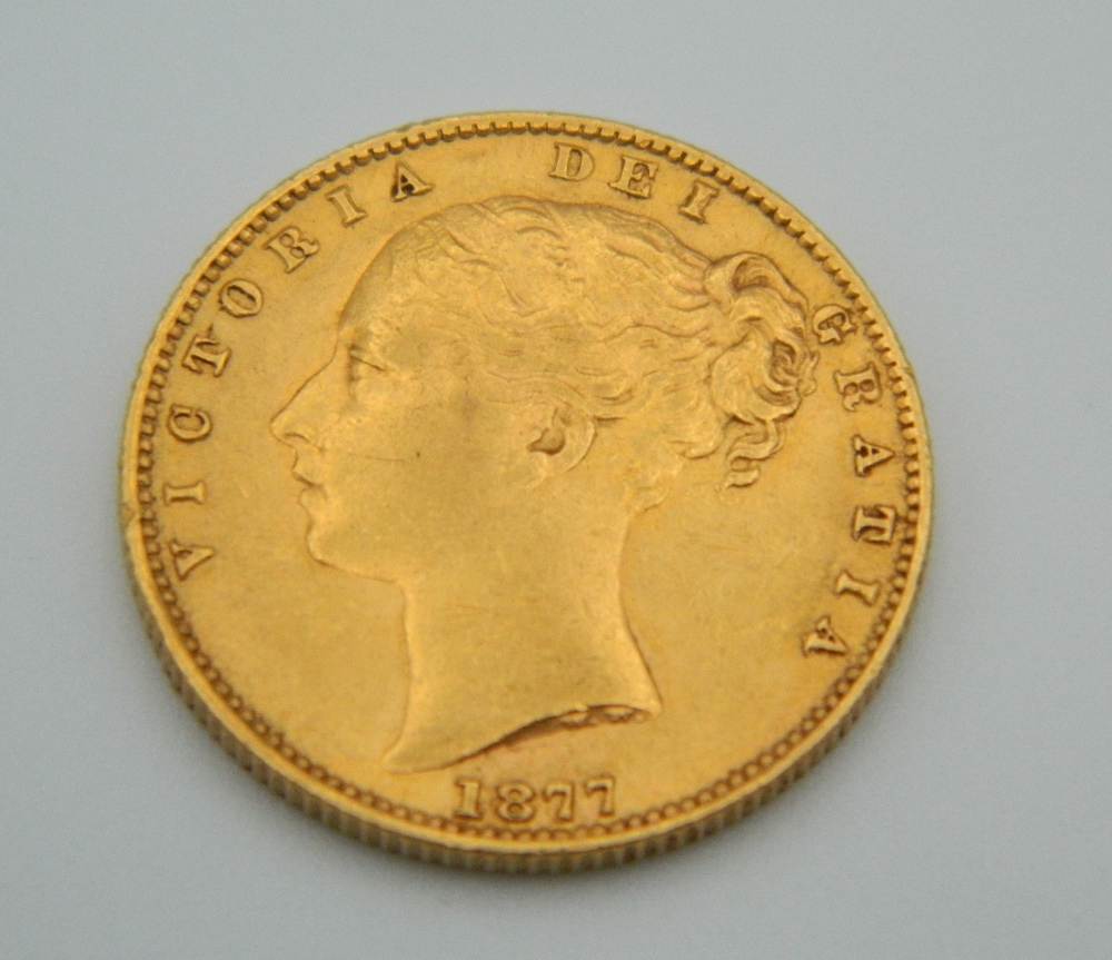 An 1877 Sydney Mint Victoria young head shield back sovereign
