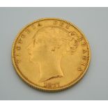 An 1877 Sydney Mint Victoria young head shield back sovereign