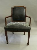 A late 19th/early 20th century mahogany open armchair. 60 cm wide.