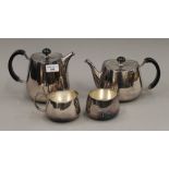 A Walker & Hall silver plated four piece tea set. The largest 15.5 cm high.