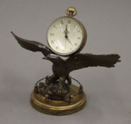 An eagle ball clock. 14 cm high.