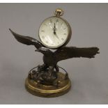 An eagle ball clock. 14 cm high.