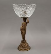 A gilt bronze centrepiece, the stem formed as a lady. 31 cm high.