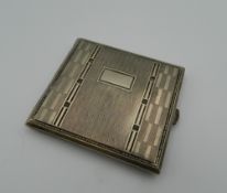 An Art Deco cigarette case. 8.5 cm wide.