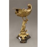 A gilt bronze centrepiece formed as a mermaid and conch shell. 38 cm high.