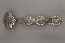 A Chinese silvered bronze ruyi sceptre. 35 cm long.