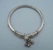 A vintage Asian silver bangle.