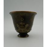 A Chinese bronze wine cup. 4 cm high.