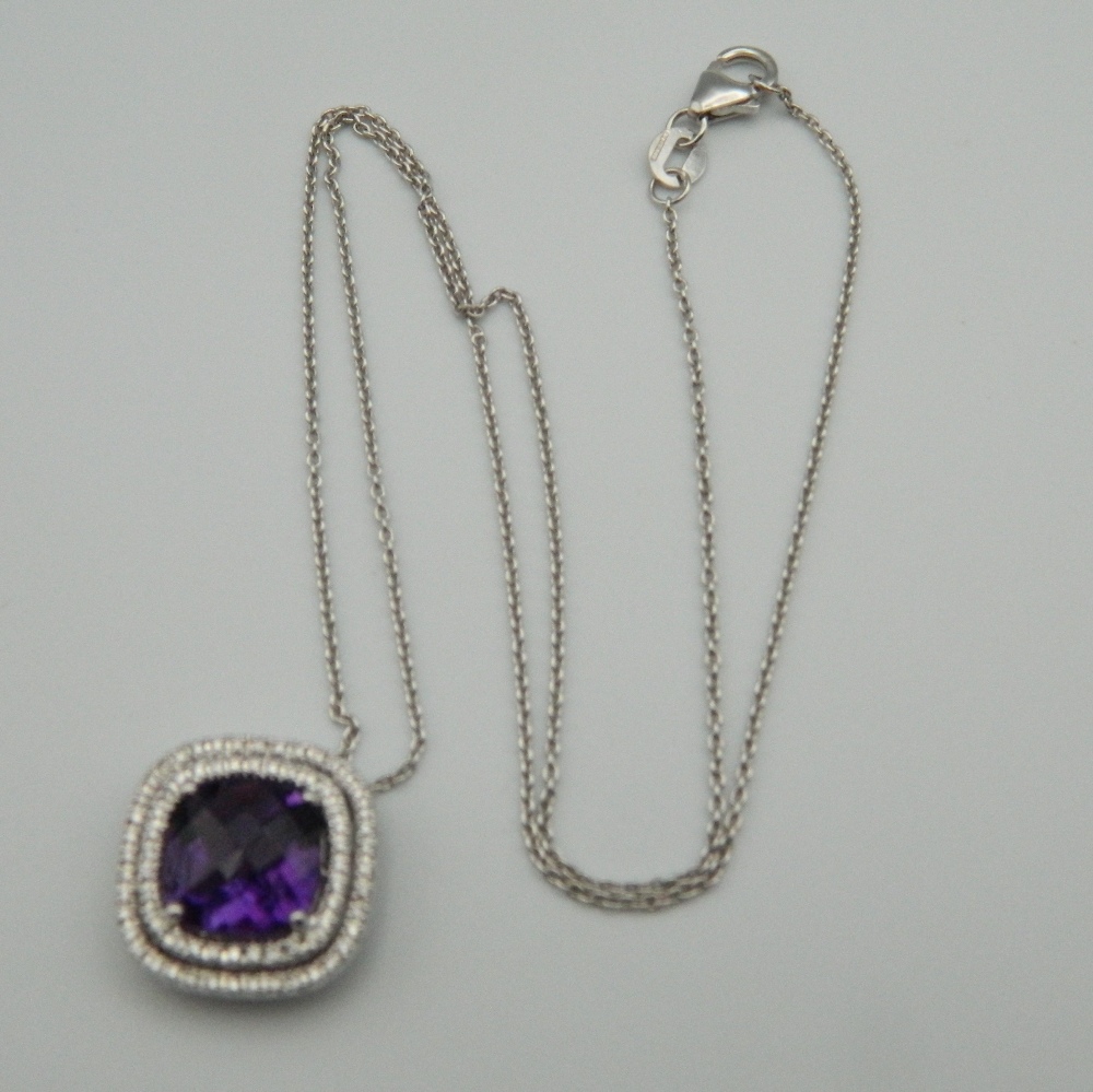 An 18 ct white gold quality amethyst and diamond pendant, on a 18 ct white gold chain. - Image 6 of 6