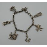 A silver charm bracelet (40 grammes).