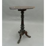 A Victorian mahogany tripod table