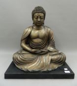 A large bronze Buddha. 58 cm high.