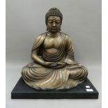 A large bronze Buddha. 58 cm high.