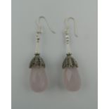 A pair of silver rose quartz and marcasite earrings. 4.5 cm high.