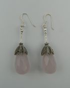 A pair of silver rose quartz and marcasite earrings. 4.5 cm high.