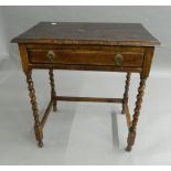 An early 20th century oak barley twist single drawer side table. 67 cm wide.