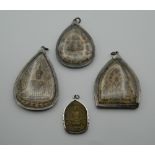 Four Eastern pendants/icons. The largest 8 cm high.