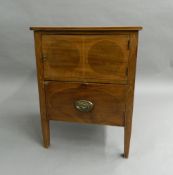 A 19th century mahogany pot cupboard. 56.5 cm wide.