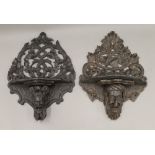 Two 19th century oak carved wall brackets. Each approximately 42 cm high.