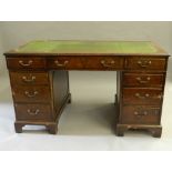 A mahogany pedestal desk. 137 cm wide.