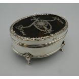 A silver and tortoiseshell trinket box. 7.5 cm wide.