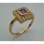 An Art Deco style 9 ct gold opal and amethyst ring. Ring Size O/P.