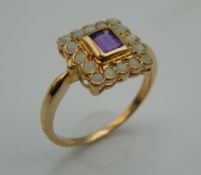 An Art Deco style 9 ct gold opal and amethyst ring. Ring Size O/P.