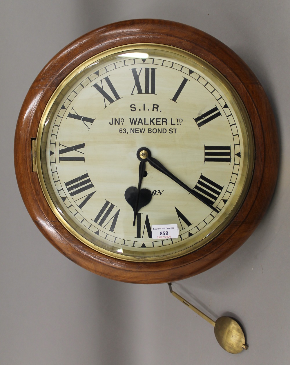 An oak cased fusee dial clock, inscribed ''S.I.R JNo Walker LTD 63 New Bond Street London''.