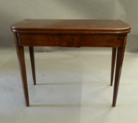 A 19th century mahogany card table. 89 cm wide.