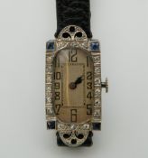 A ladies 1930s cased platinum diamond and sapphire set cocktail watch, on a modern leather strap. 3.