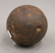 An 18th century canon ball from Tilbury Fort, Essex. 12 cm diameter.