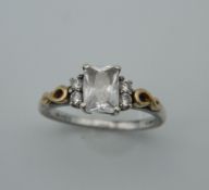 A 9 ct gold and silver ring. Ring Size L (2.