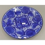 A late 19th century Japanese blue and white porcelain charger. 46 cm diameter.