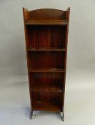 An Edwardian mahogany bookcase. 122 cm high.