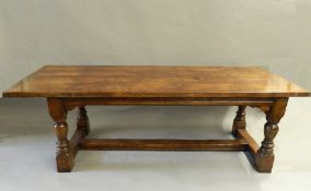 A large modern oak refectory table. 228 cm long x 86.5 cms wide x 75.5 cm high.