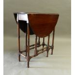 An early 20th century spider leg gate leg table. 66 cm wide.