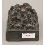 A Chinese bronze dragon fo dog seal. 9.5 cm high.