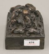 A Chinese bronze dragon fo dog seal. 9.5 cm high.