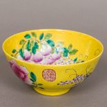 A Chinese yellow ground crackle glaze porcelain bowl The interior decorated with a fruiting spray,