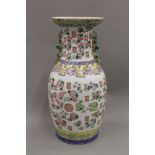 A large Chinese baluster shaped vase in the famille rose palette,