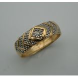A 9 ct gold gentleman's diamond ring. Ring Size V/W (3.