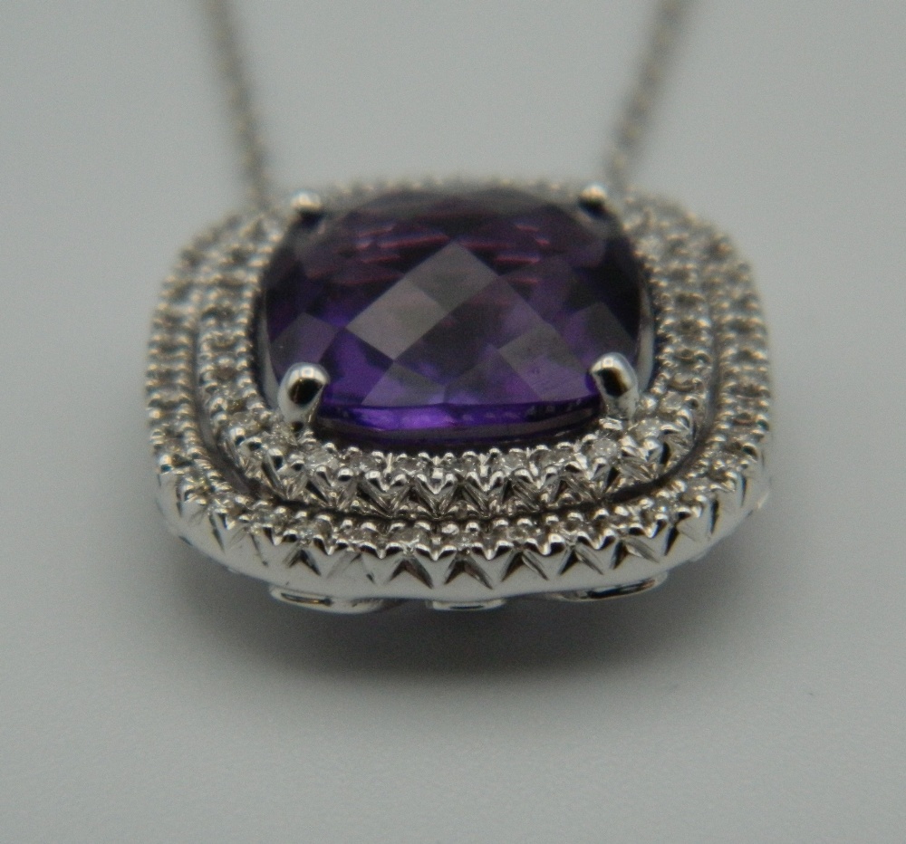 An 18 ct white gold quality amethyst and diamond pendant, on a 18 ct white gold chain. - Image 3 of 6