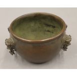 A Chinese bronze censer with chains. 10.5 cm diameter.
