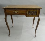 An Edwardian mahogany lady's writing table. 76 cm wide.