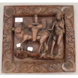 An Eastern hardwood carving of a man and cow. 35 cm wide.