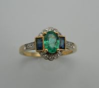 An Art Deco style 9 ct gold emerald, sapphire and diamond ring. Ring Size N/O.