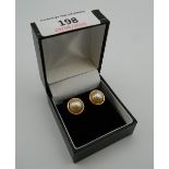 A pair of 9 ct gold and marble pearl earrings. 1.