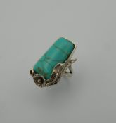 A silver and turquoise ring. Ring Size P.