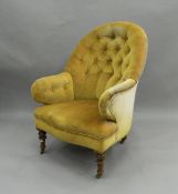 A Victorian button upholstered spoon back armchair. 67 cm wide.